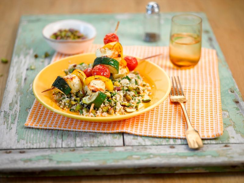 Cauliflower And Pistachio Couscous With Halloumi And Vegetable Kebabs