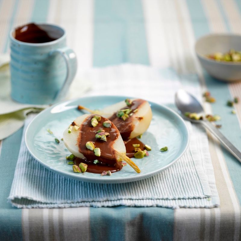 Poached Pears With Chocolate Sauce And Pistachios Poached Pears With Chocolate Sauce And Pistachios