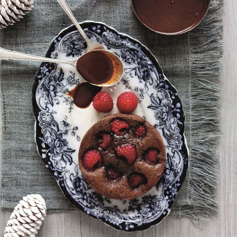 Baked Raspberry And Chocolate Puddings With Rich Dark Chocolate Sauce