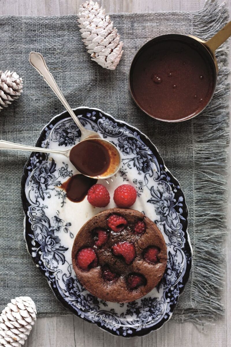 Baked Raspberry And Chocolate Puddings With Rich Dark Chocolate Sauce