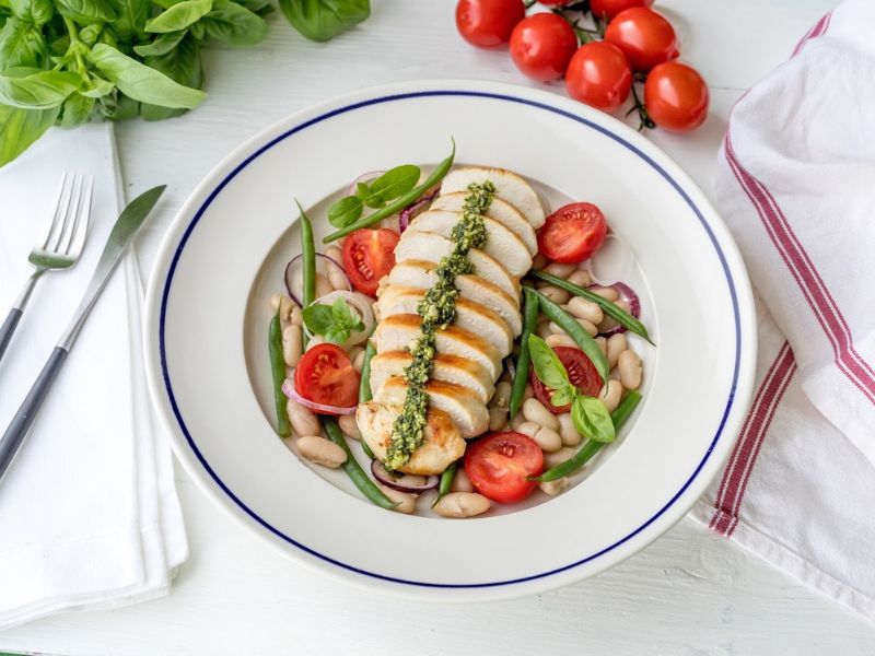Chicken Breast with Haricot Beans, Tomatoes and Pesto Dressing