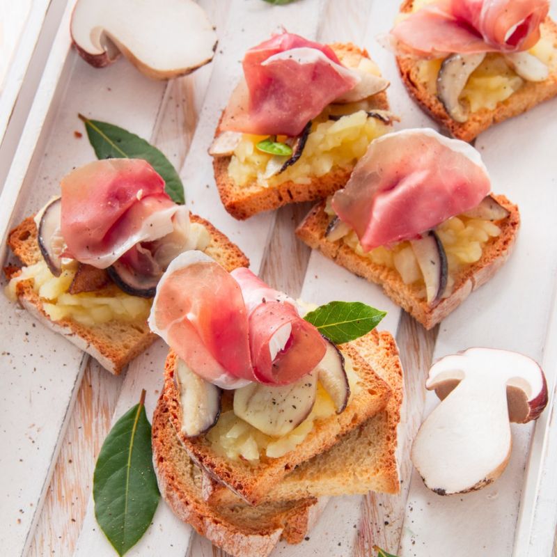 Bruschettas With Mushrooms, Sweet And Sour Apple Sauce And Parma Ham