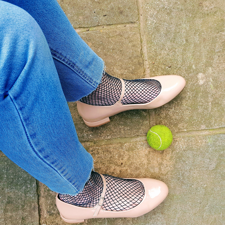 Elevating Your Style with Jeans and Fishnet Socks