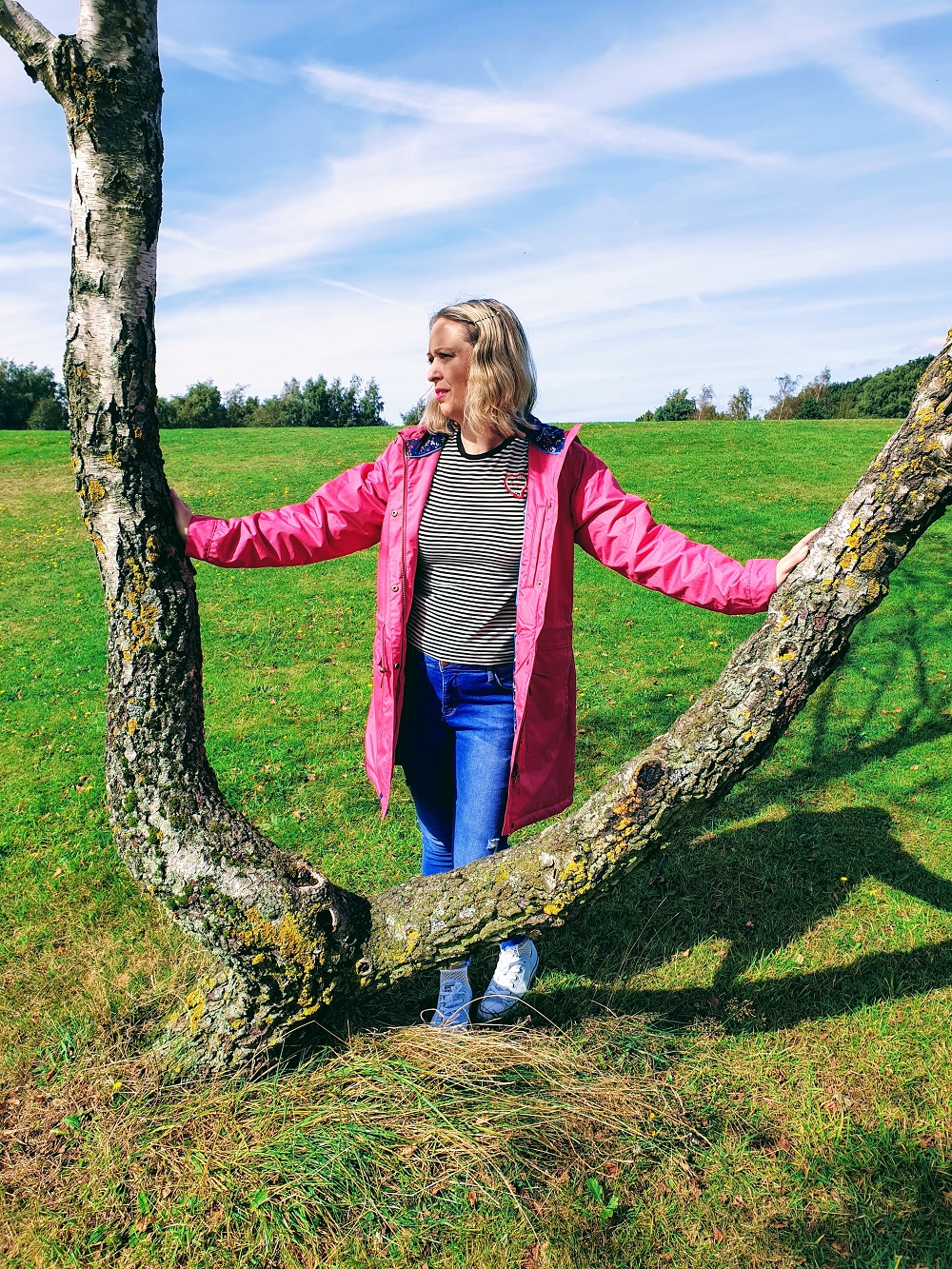 Welcoming Autumn In With A Lighthouse Pink Raincoat. Welcoming Autumn In With A Lighthouse Pink Raincoat.