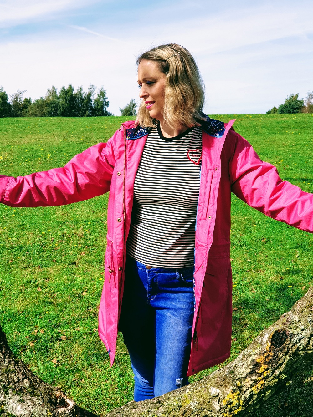 Welcoming Autumn In With A Lighthouse Pink Raincoat. Welcoming Autumn In With A Lighthouse Pink Raincoat.