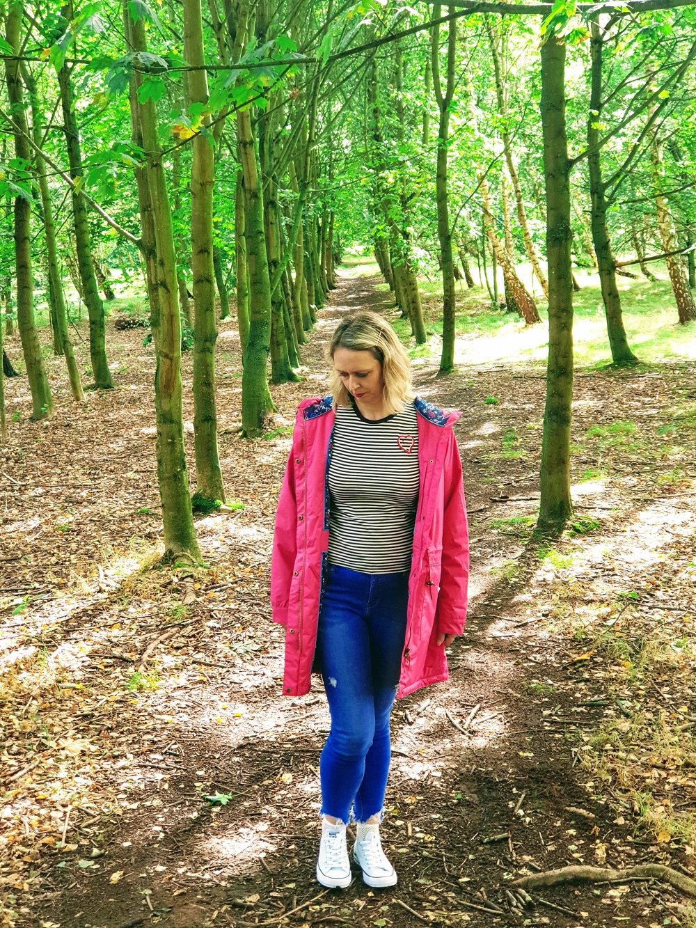 Welcoming Autumn In With A Lighthouse Pink Raincoat. Welcoming Autumn In With A Lighthouse Pink Raincoat.