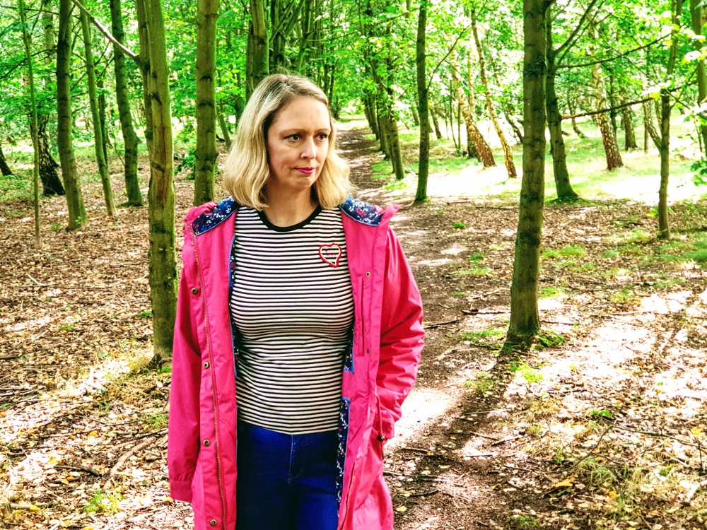 Welcoming Autumn In With A Lighthouse Pink Raincoat. Welcoming Autumn In With A Lighthouse Pink Raincoat.