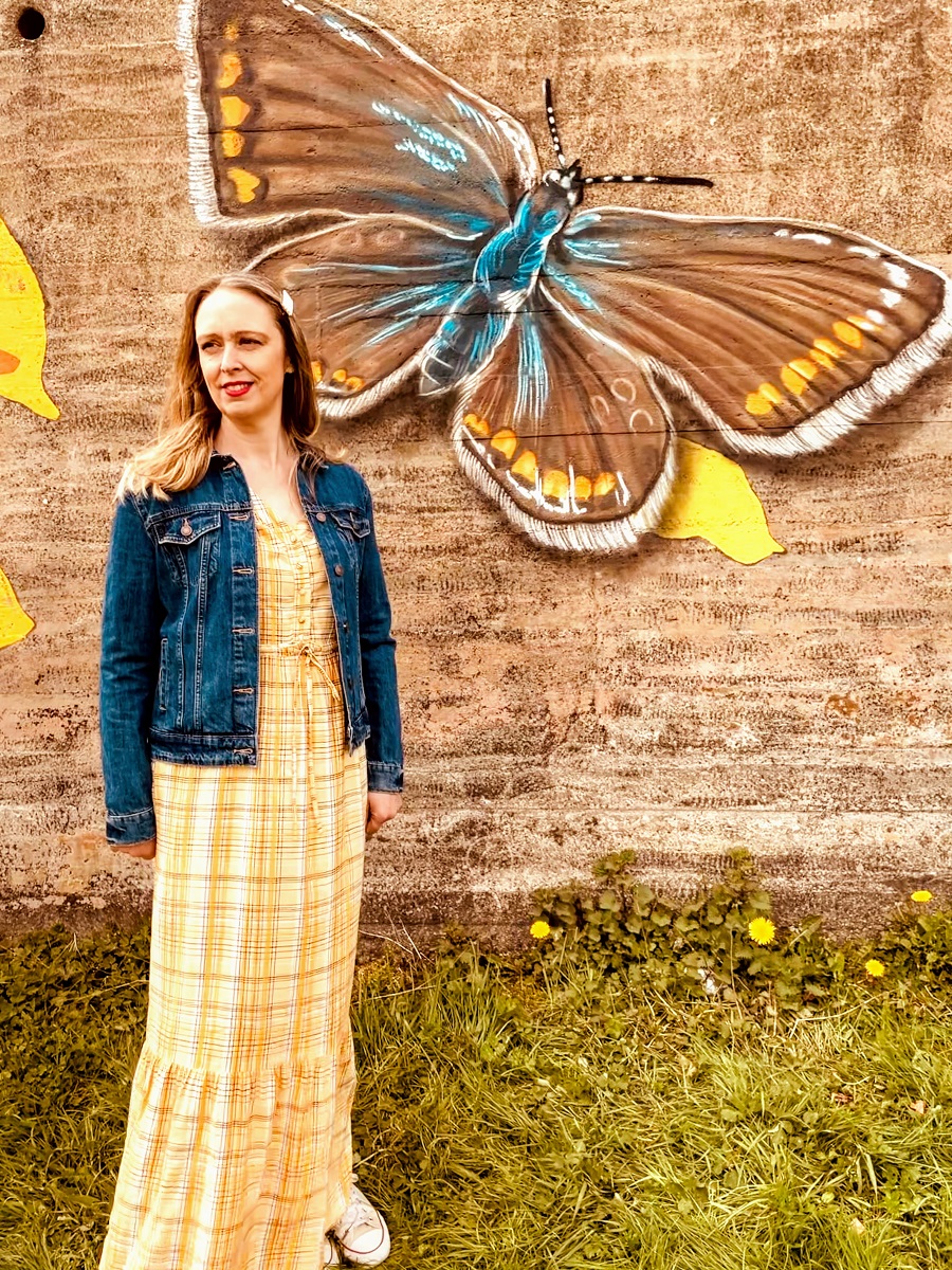 Denim Jacket, Yellow Maxi Dress And A Beautiful Butterfly Street Art. Denim Jacket, Yellow Maxi Dress And A Beautiful Butterfly Street Art.