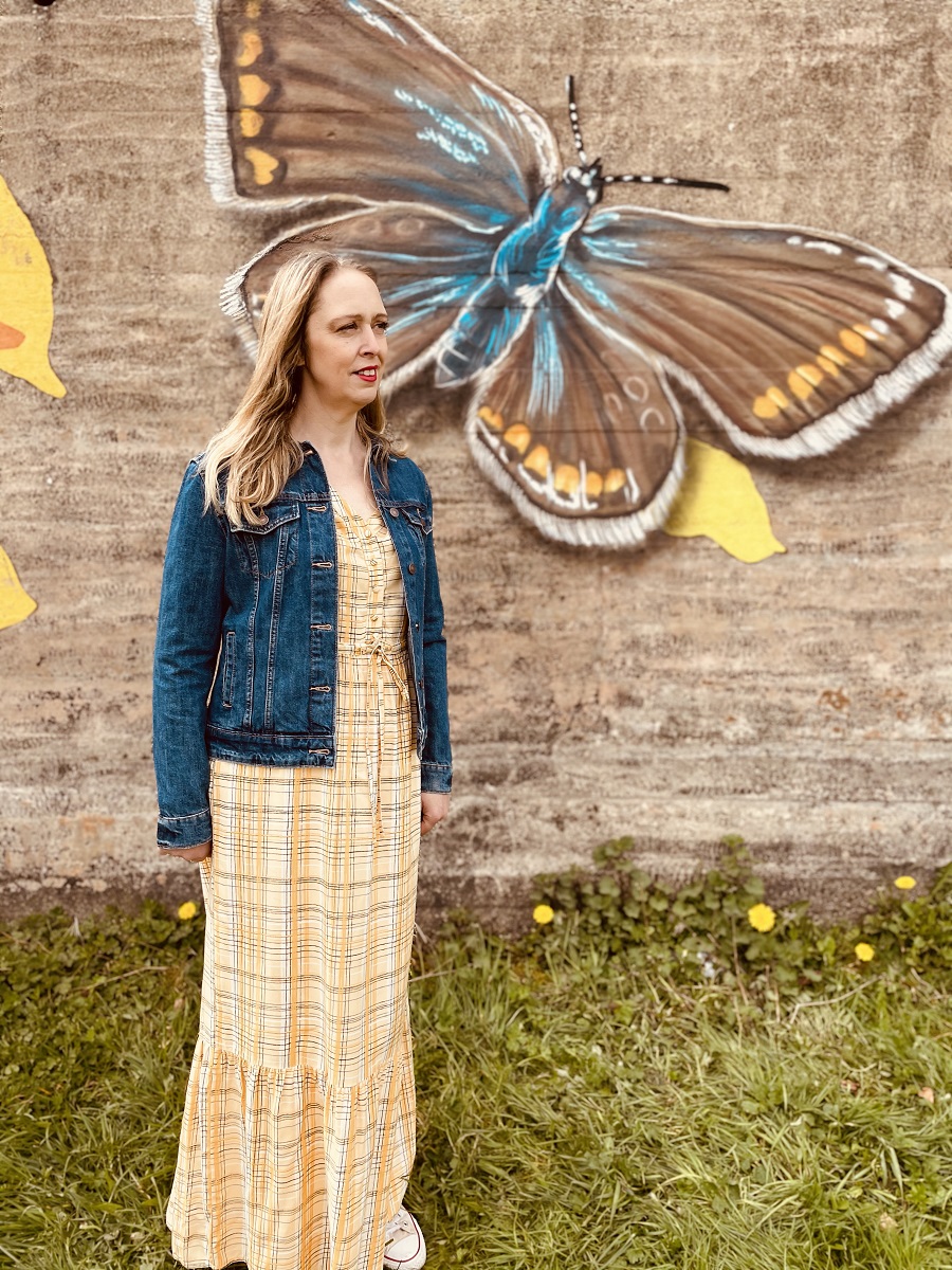 Denim Jacket, Yellow Maxi Dress And A Beautiful Butterfly Street Art. Denim Jacket, Yellow Maxi Dress And A Beautiful Butterfly Street Art.