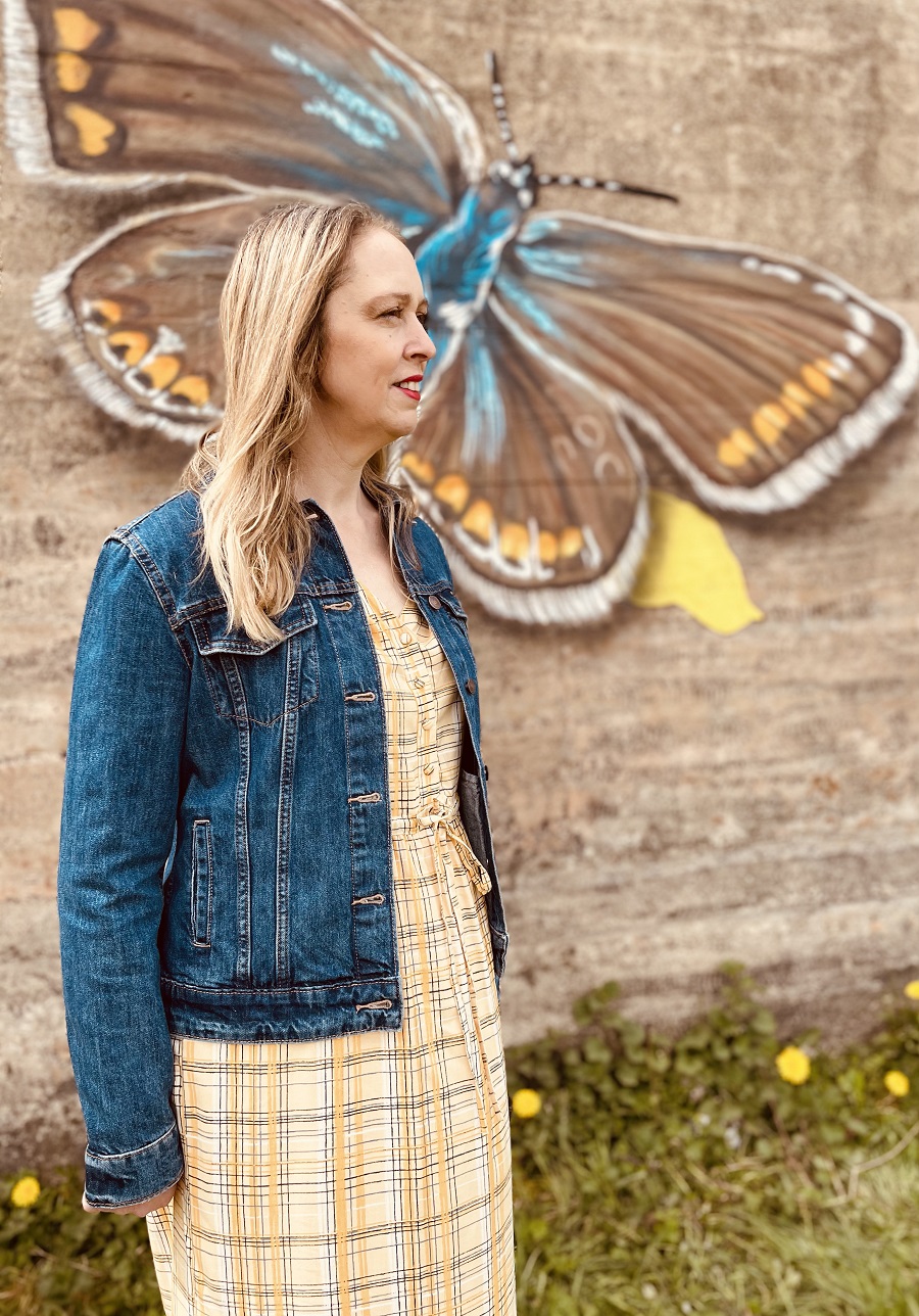 Denim Jacket, Yellow Maxi Dress And A Beautiful Butterfly Street Art. Denim Jacket, Yellow Maxi Dress And A Beautiful Butterfly Street Art.