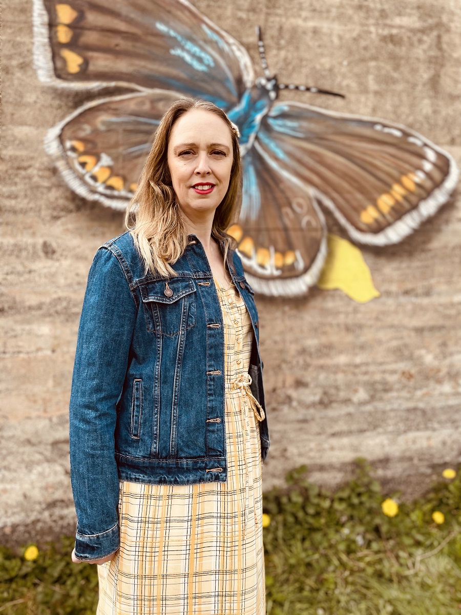 Denim Jacket, Yellow Maxi Dress And A Beautiful Butterfly Street Art. Denim Jacket, Yellow Maxi Dress And A Beautiful Butterfly Street Art.