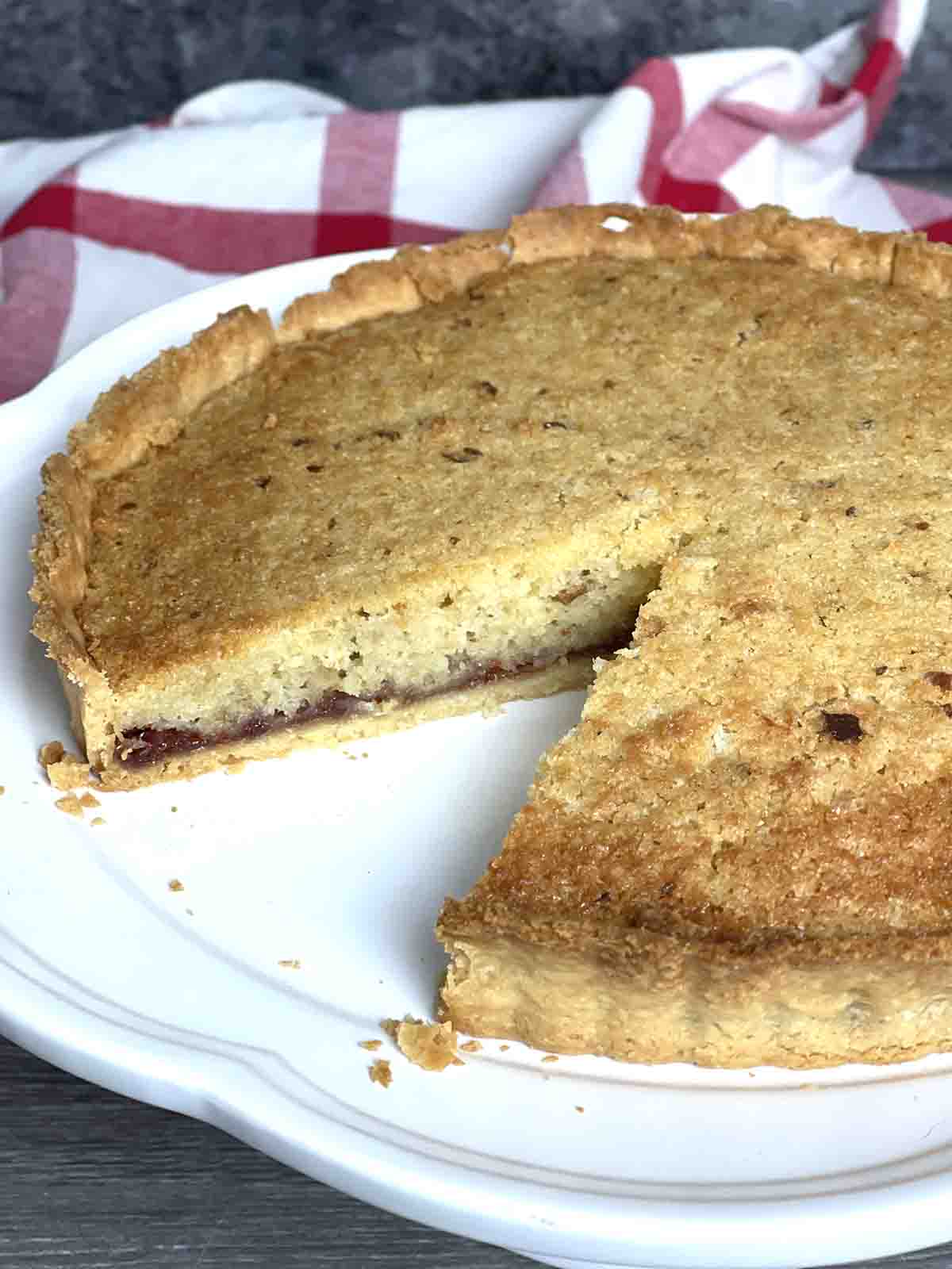 slice taked from cooked buxton tart.