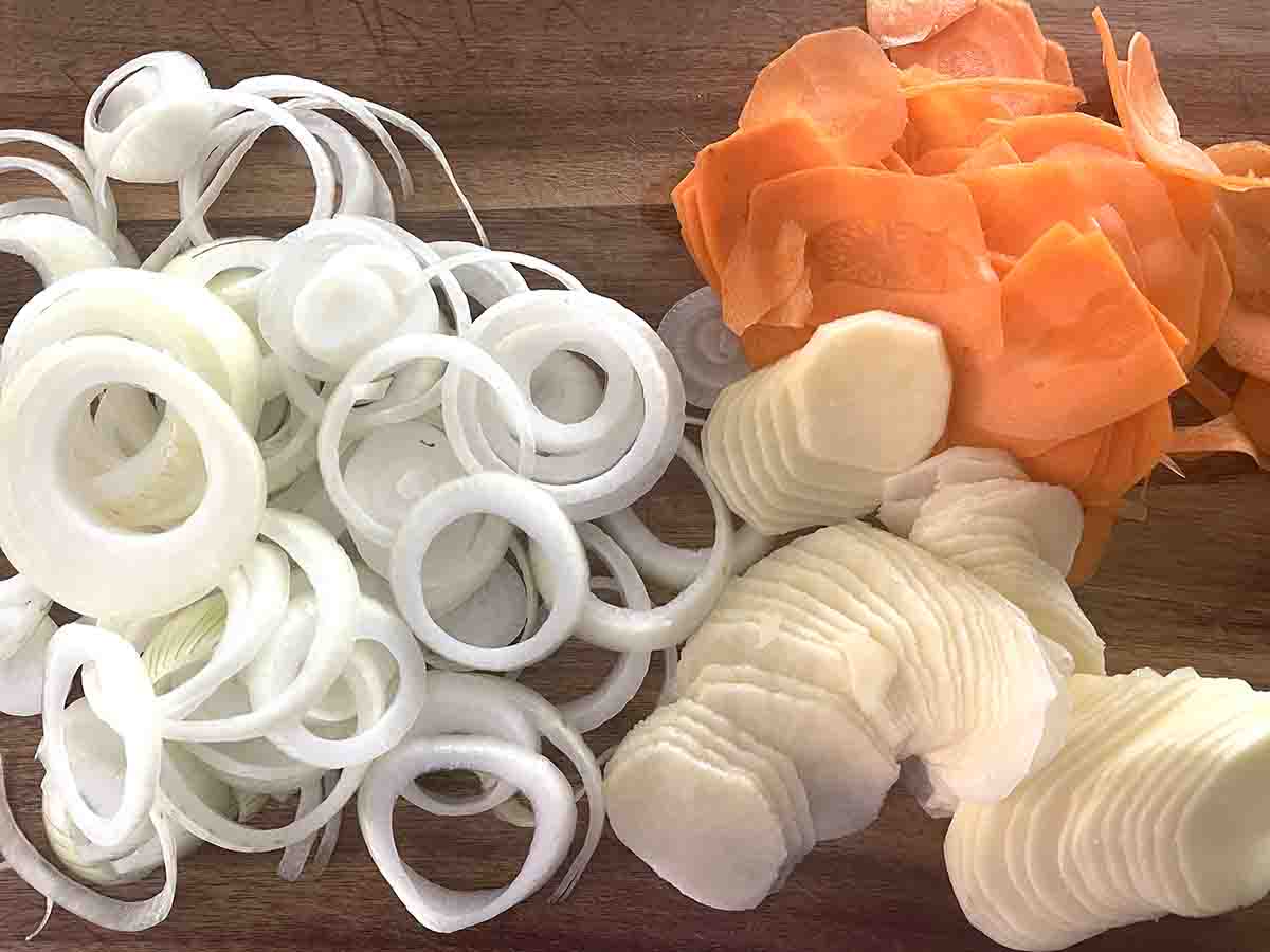 sliced vegetables on a board.