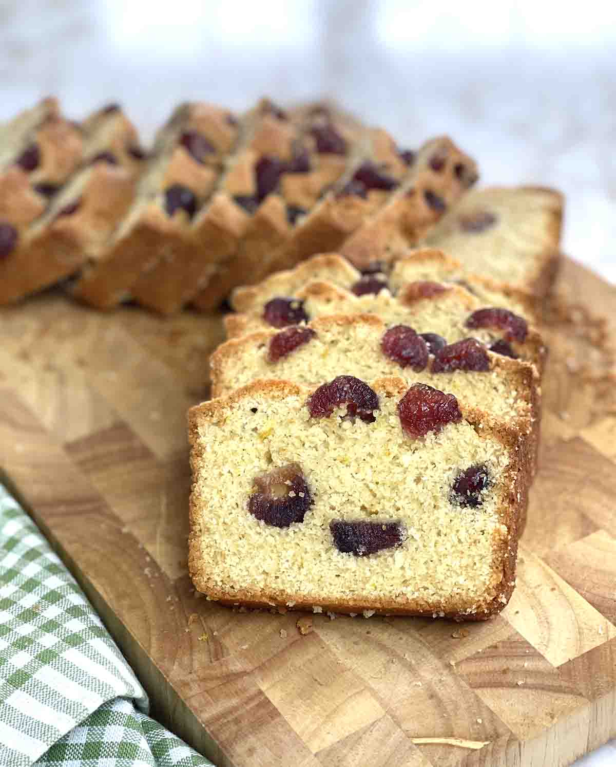 slices of cherry madeira cake on a chopping board.