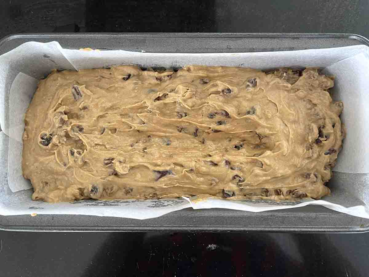 mixture in lined loaf tin ready to cook.