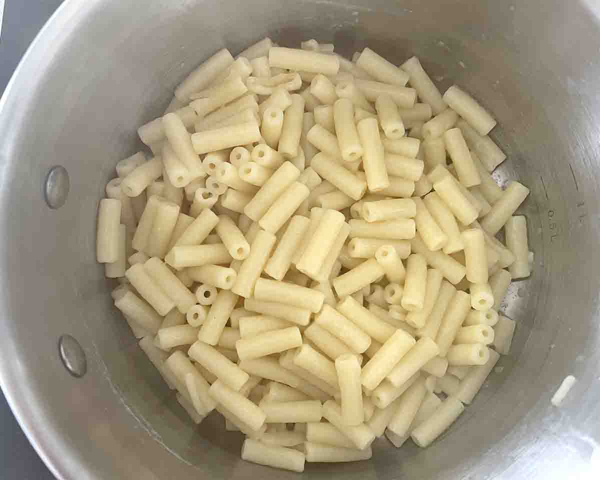 cooked pasta in a saucepan.