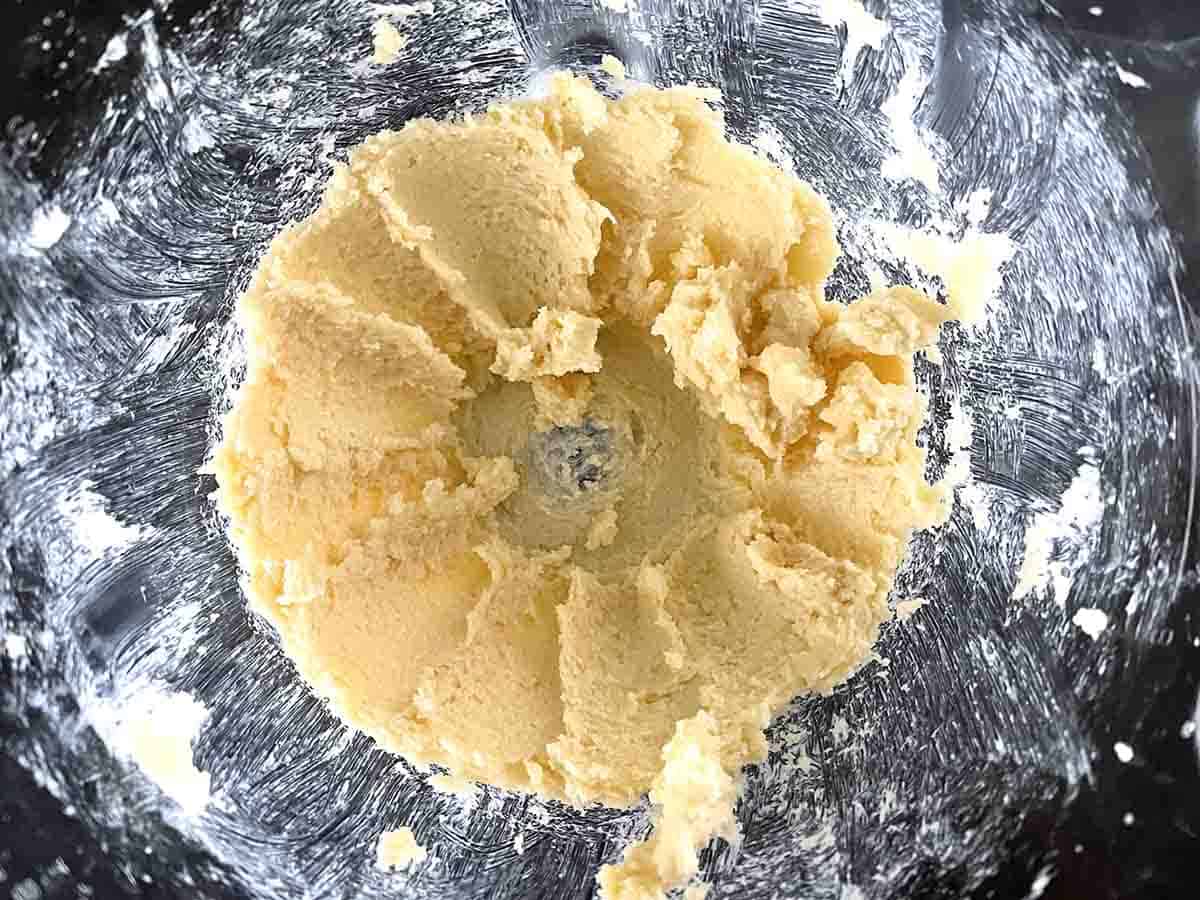 creamed butter and sugar in a glass bowl.