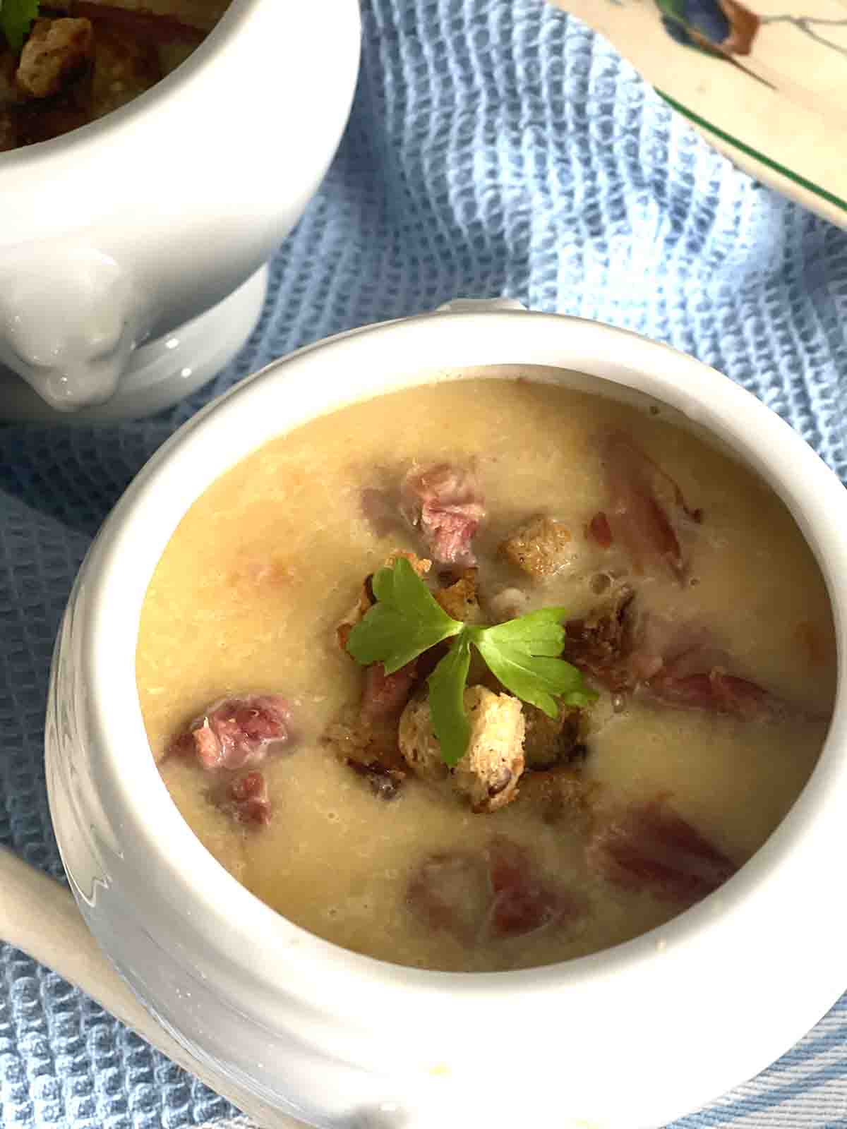 spit pea and ham soup in a bowl.