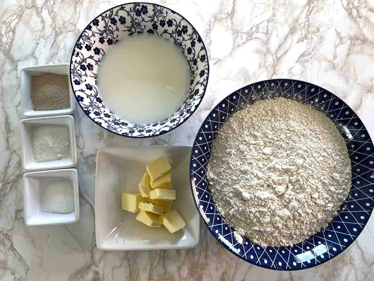 ingredients including flour, milk, yeast, sugar and butter.