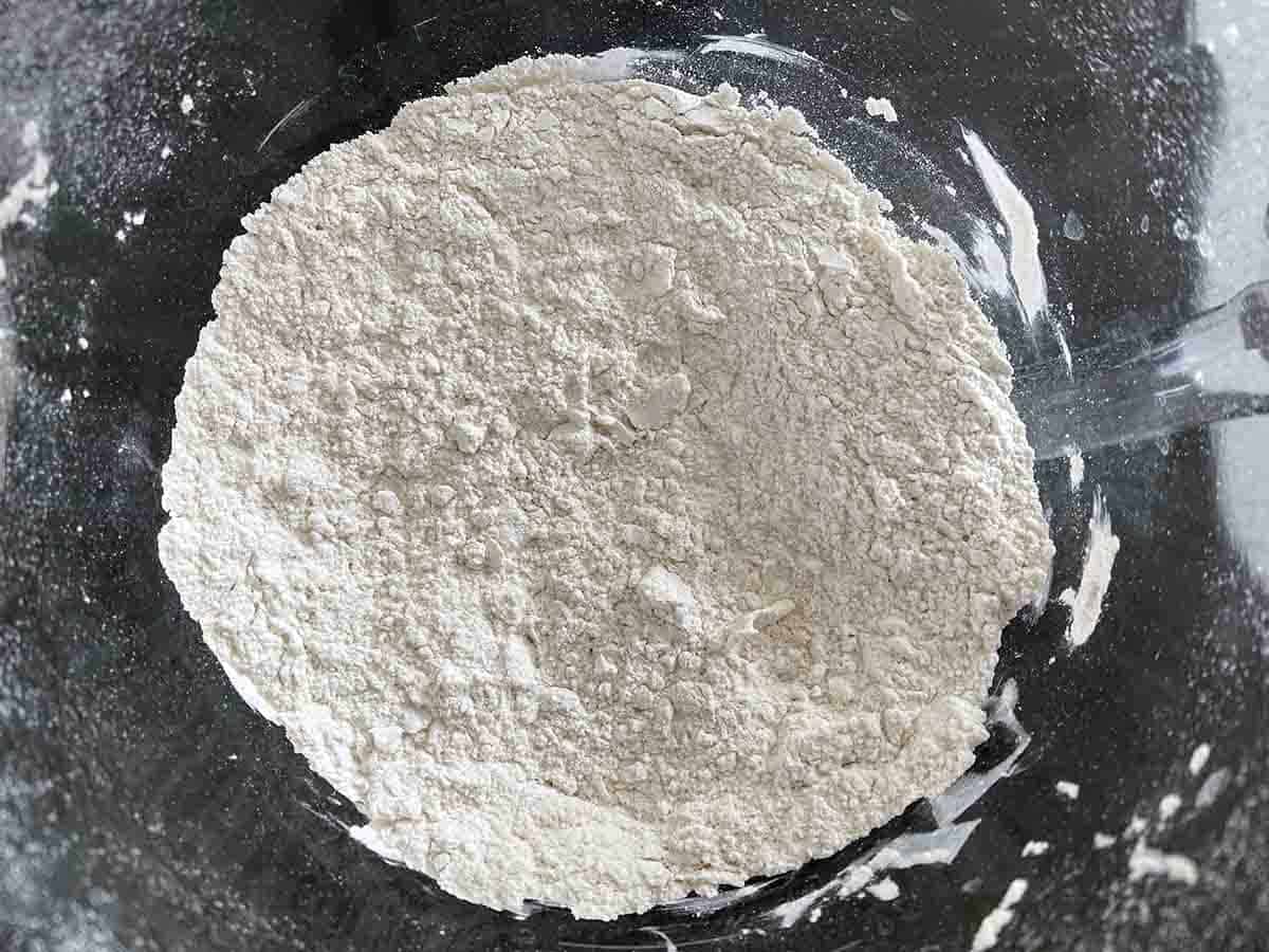 flour, sugar and salt mixed in a bowl.