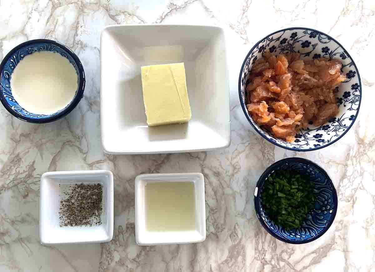 ingredients in dishes including smoked salmon. butter, chives and cream.