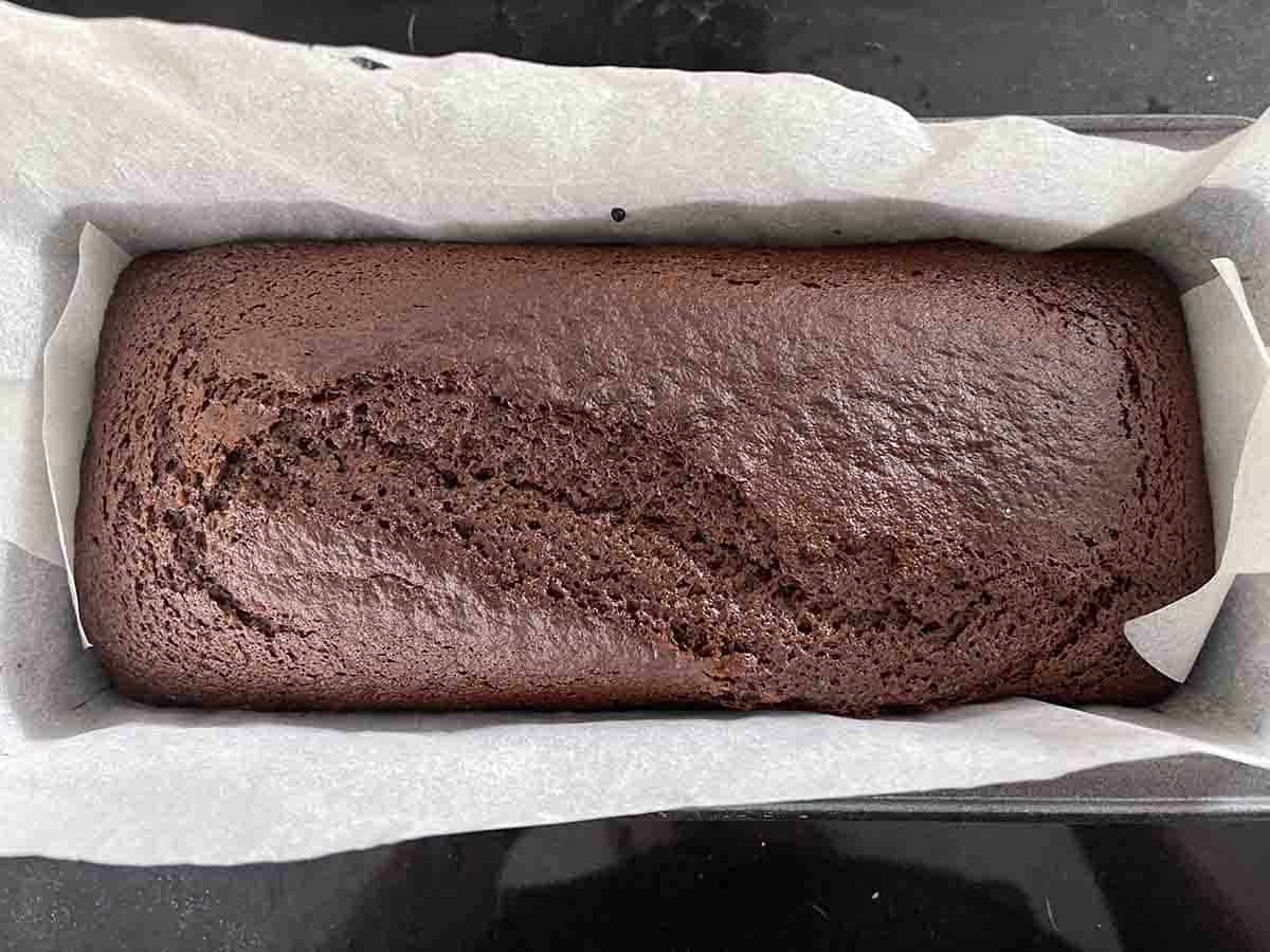sticky ginger cake cooked and cooling in the tin.