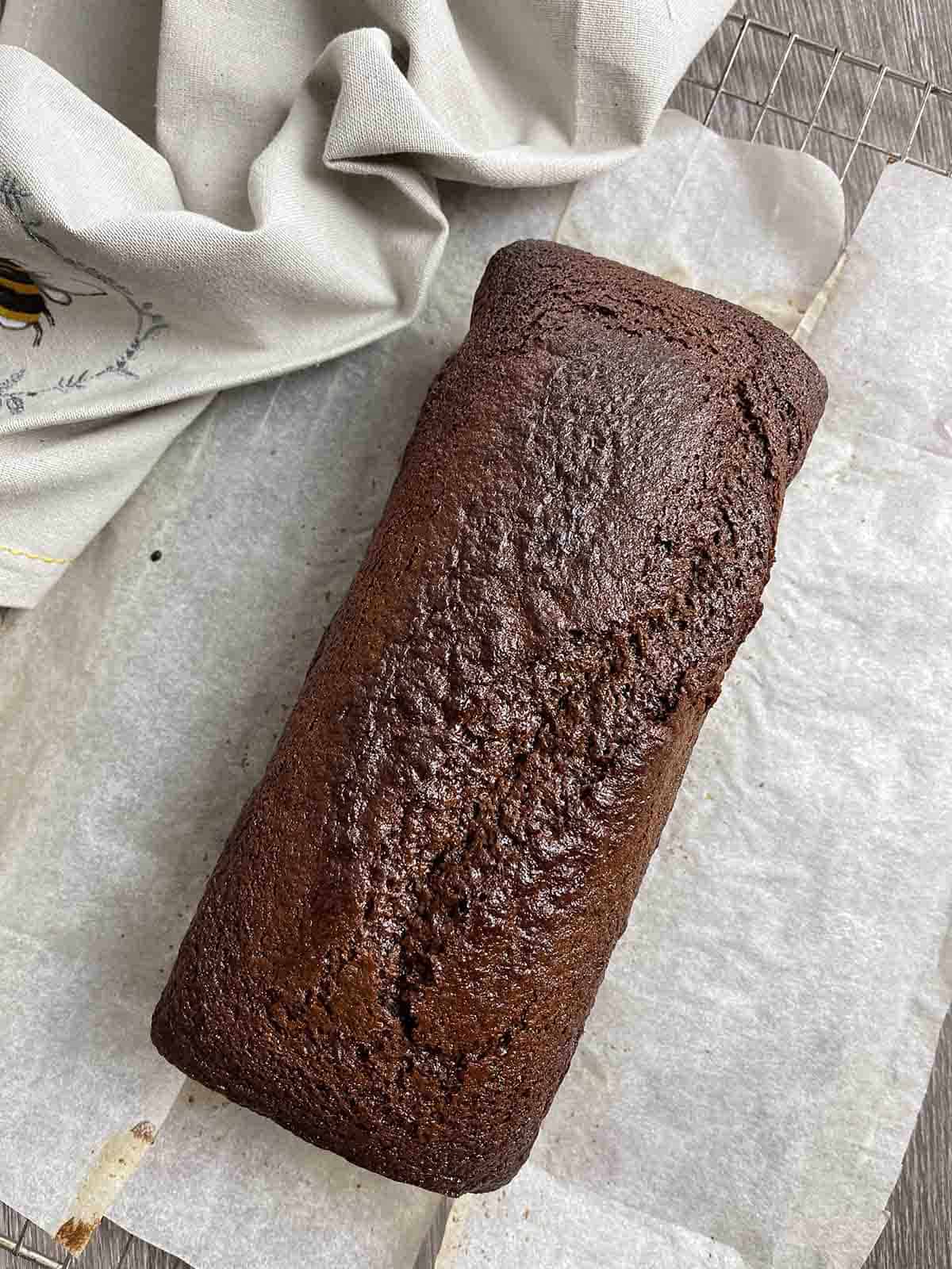view of a sticky ginger loaf cake from above.