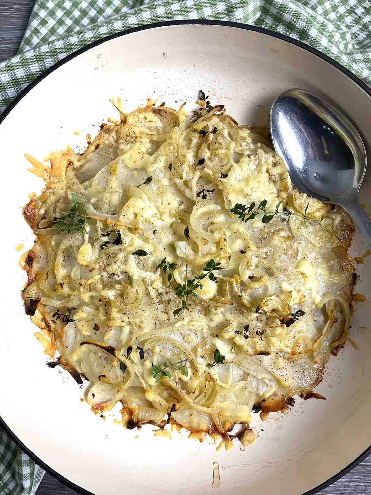pan haggerty potato dish in a cast iron dish.