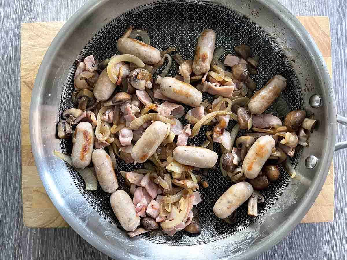 cooked mixture in the pan ready for baking.