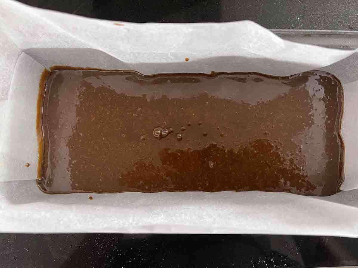 loaf tin filled with cake mixture.
