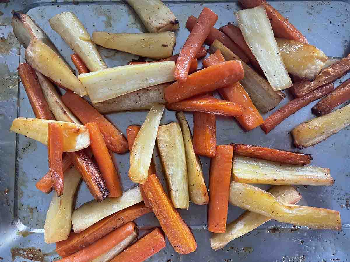vegetables baked with honey in a tray.