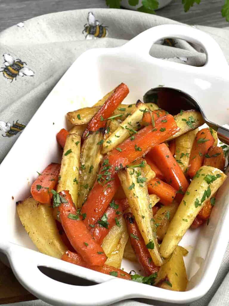 honey roasted vegetables in a serving dish.