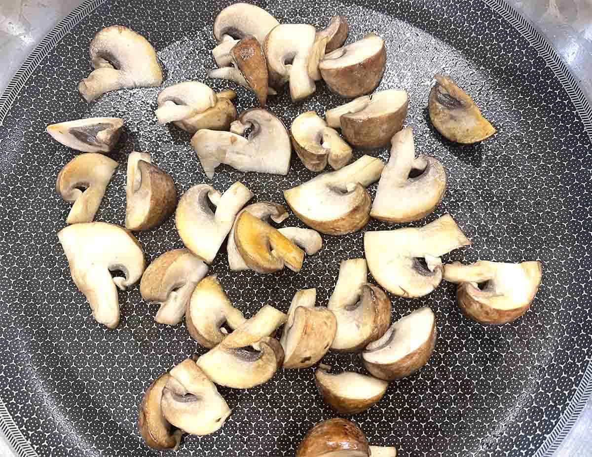 mushrooms in a frying pan.