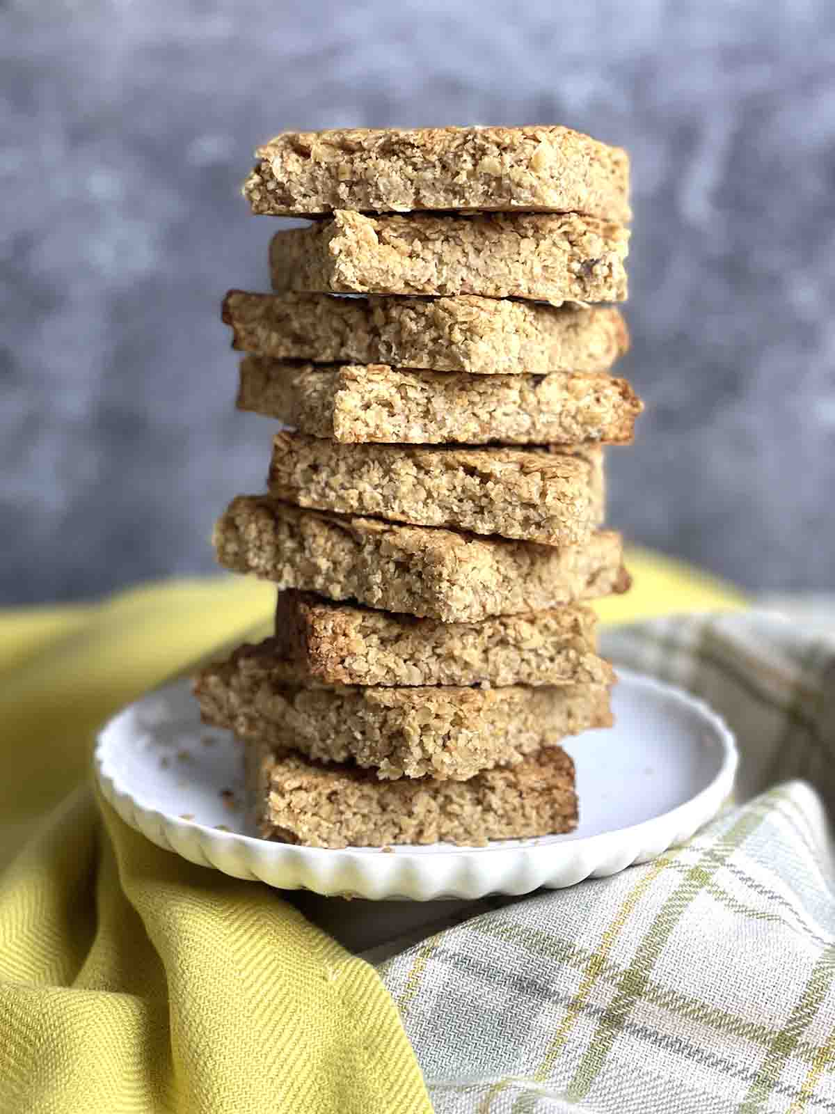 flapjack squares in a pile on a plate.