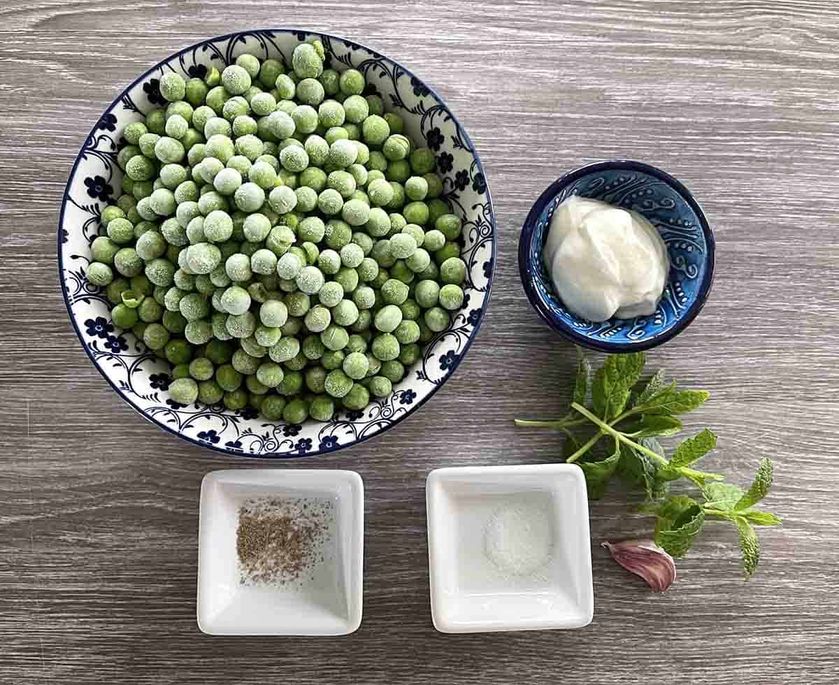 ingredients in dishes including peas, creme fraiche, salt and pepper.