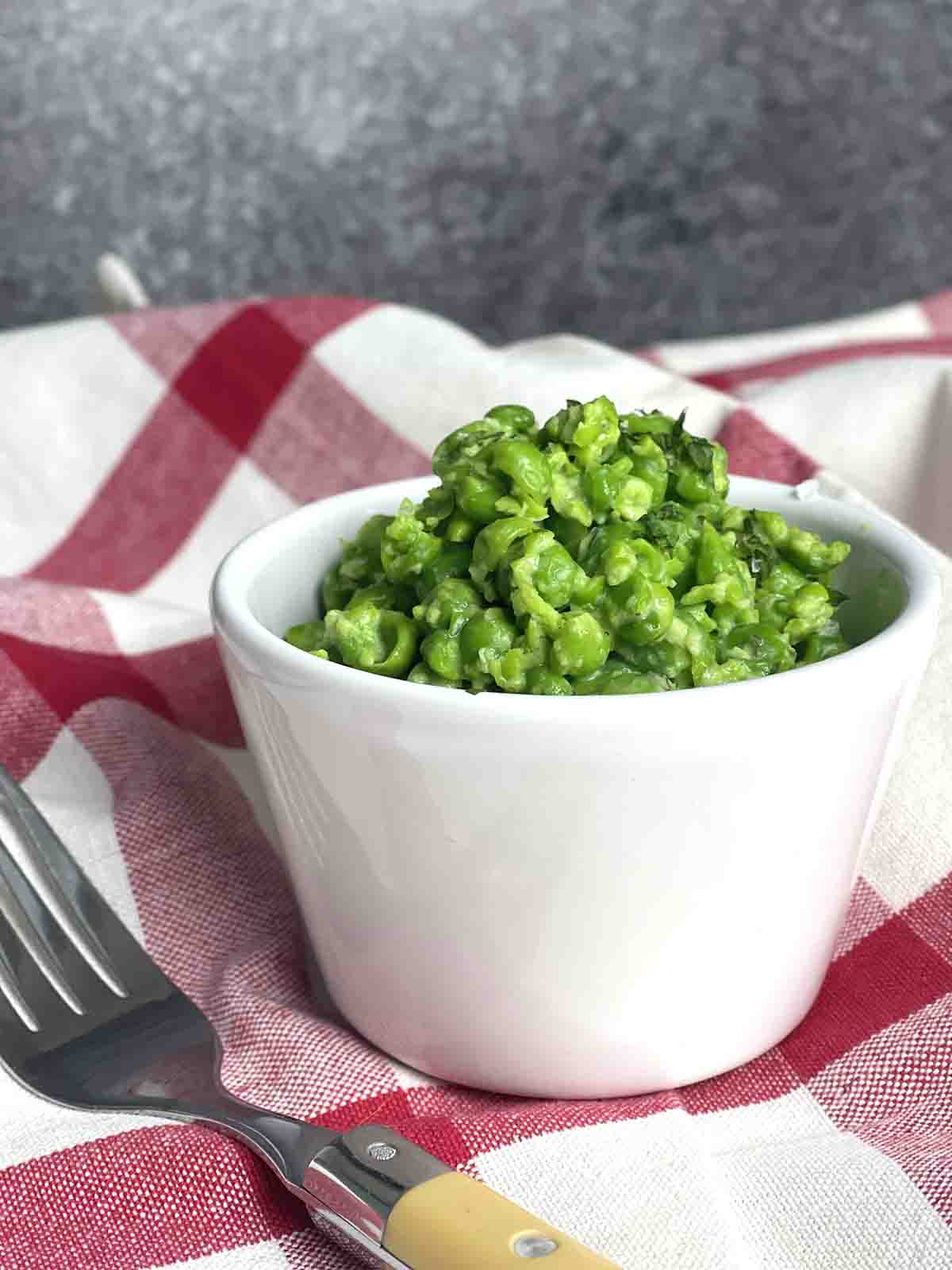 mashed peas in a dish.