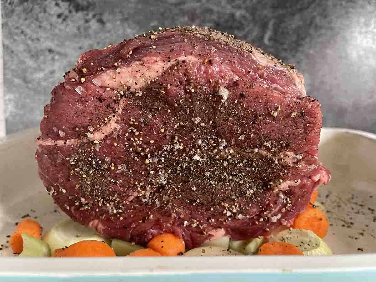rib of beef in the roasting tray.
