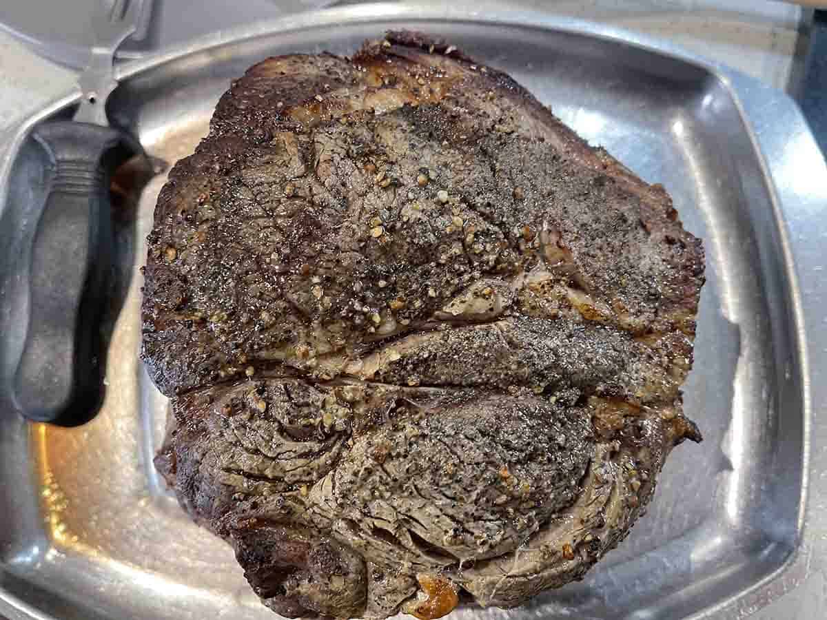 meat on a carving tray.