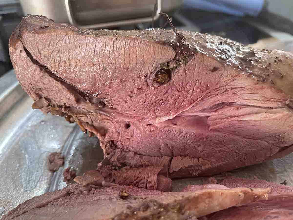 vension with a cut slice.