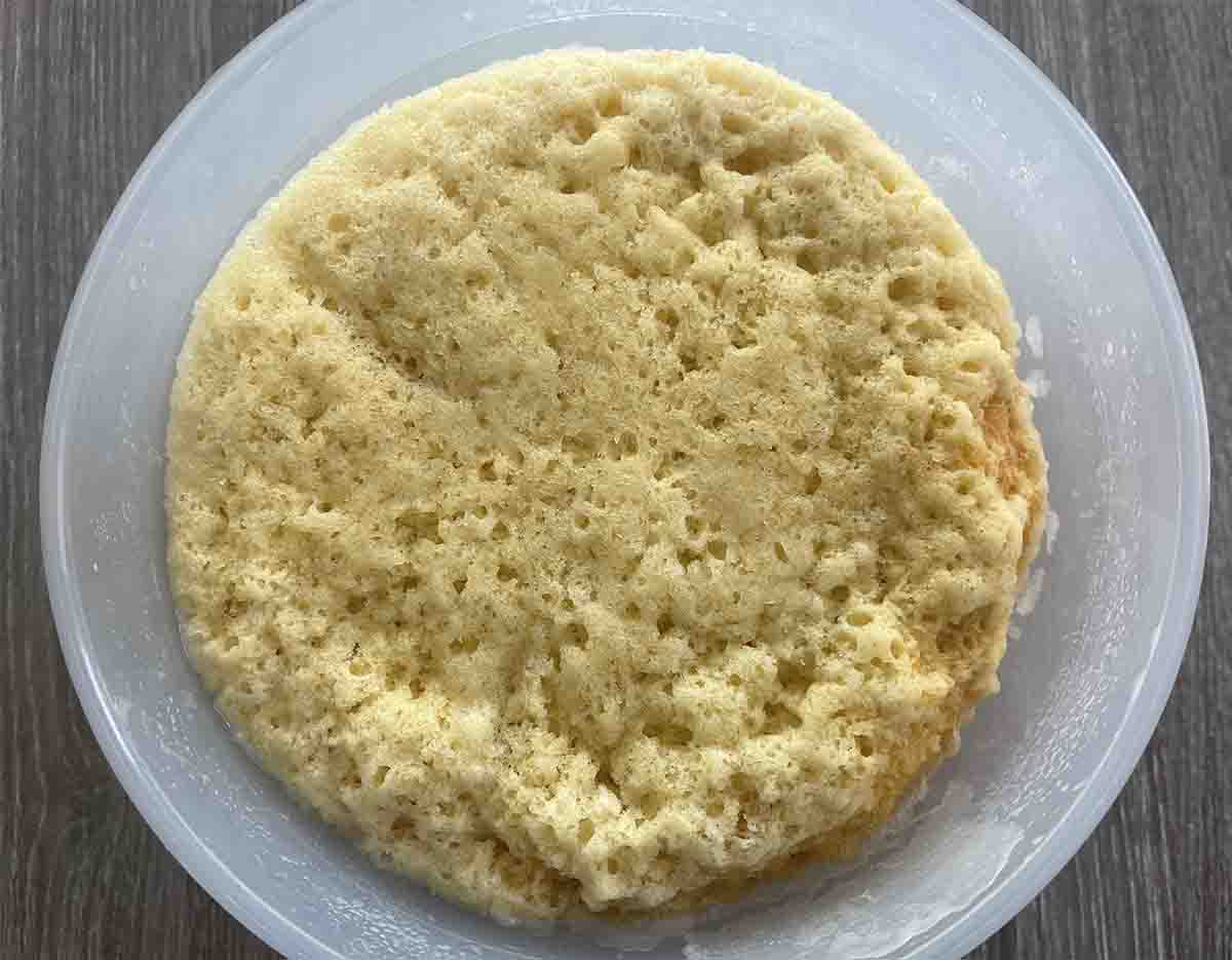 cooked microwave syrup sponge in a bowl.