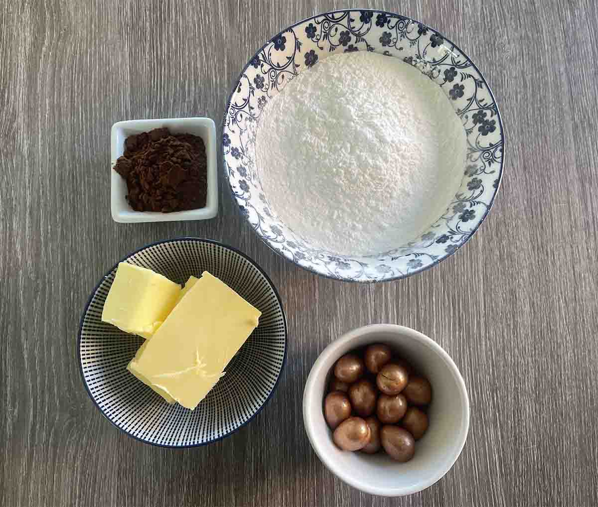 icing ingredients including mini eggs, icing sugar, butter and cocoa.