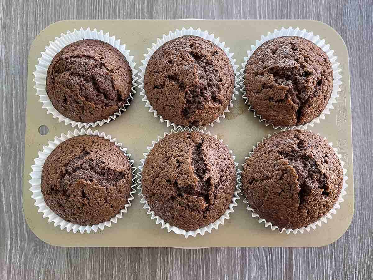 cooked cakes in a muffin tin.