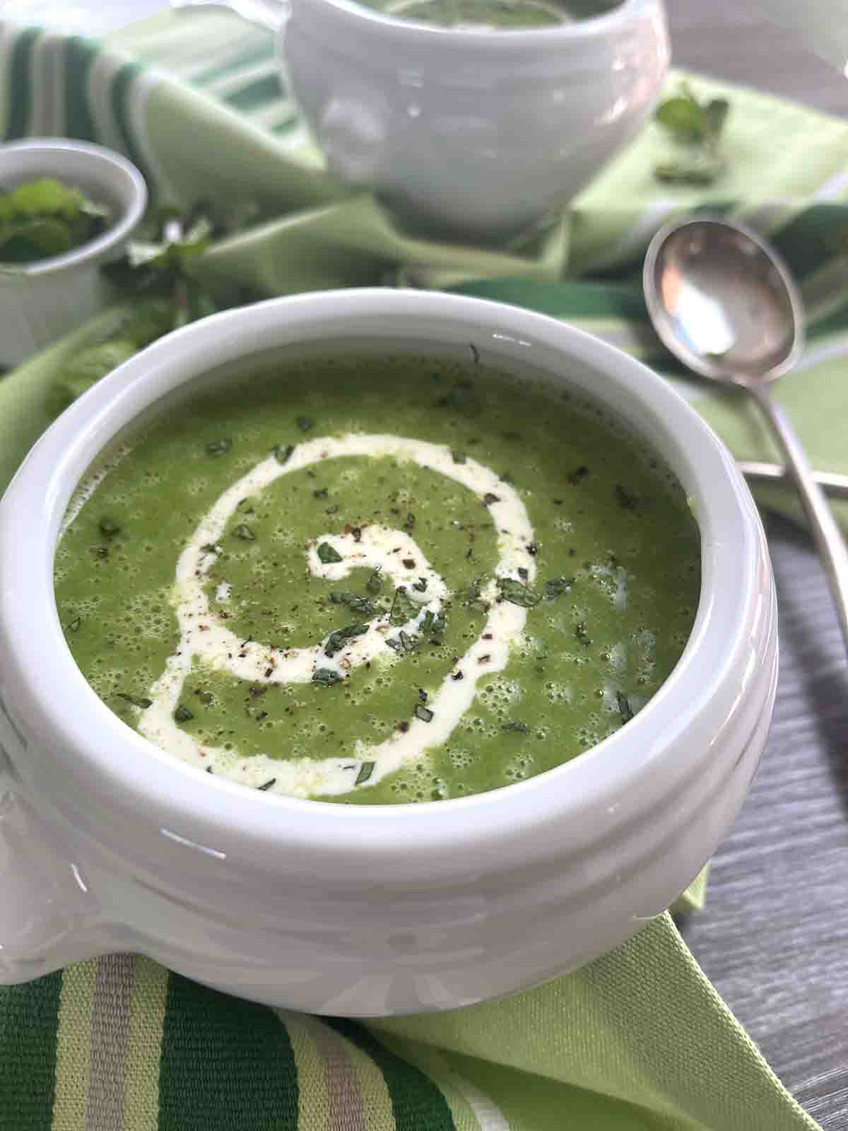 close up of soup in a white bowl.