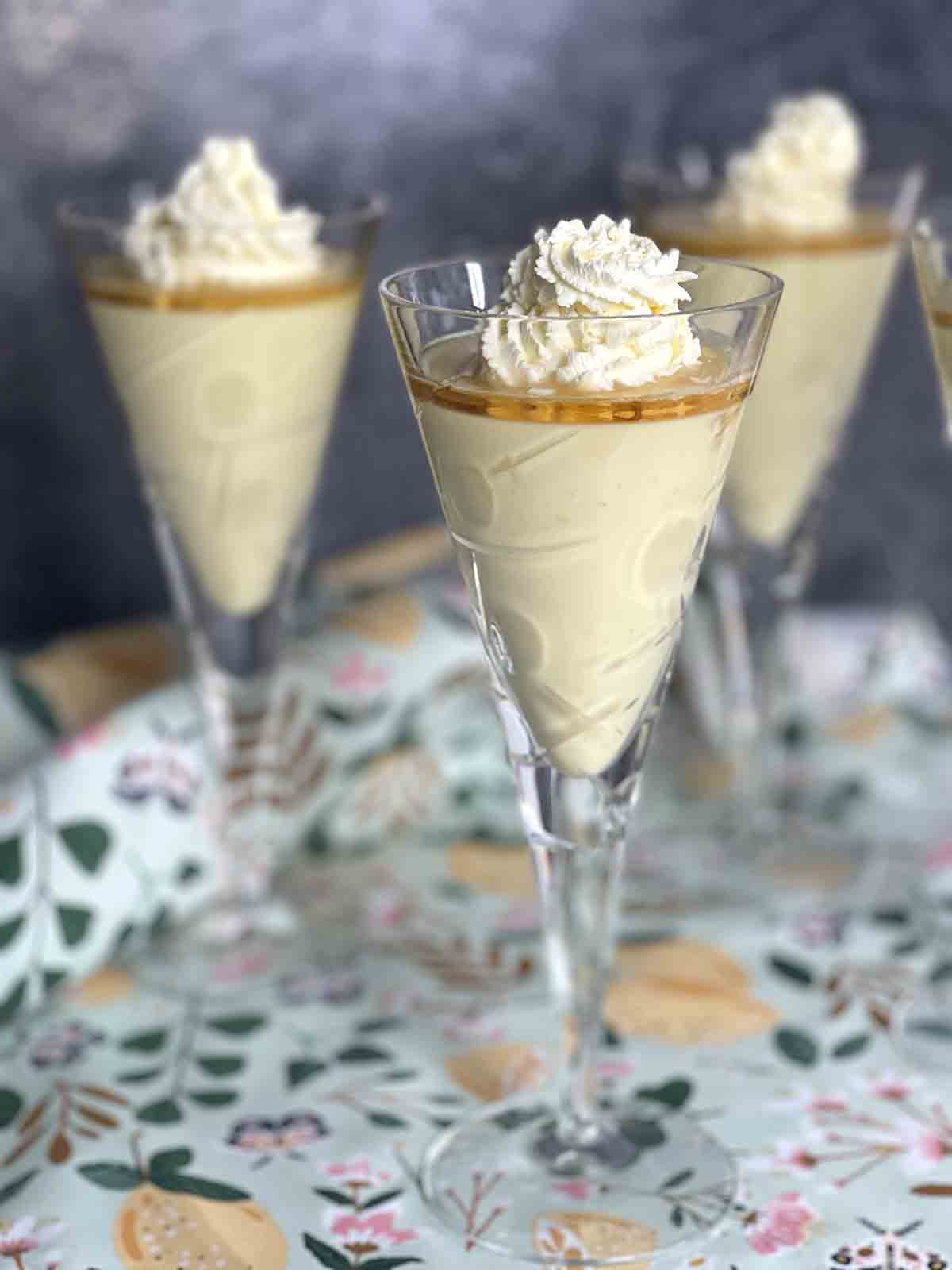 3 glasses of orange dessert.