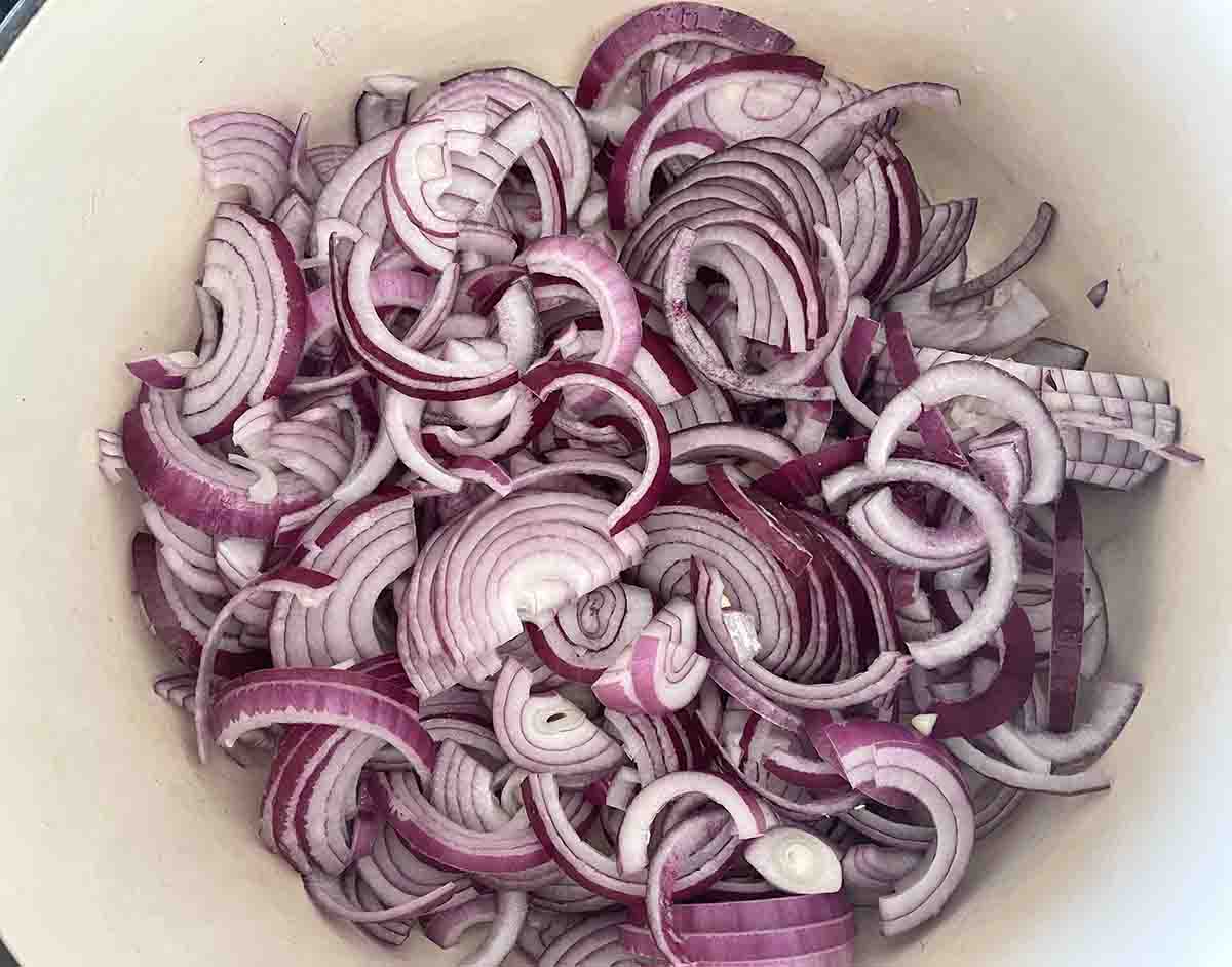 sliced onions in a saucepan.