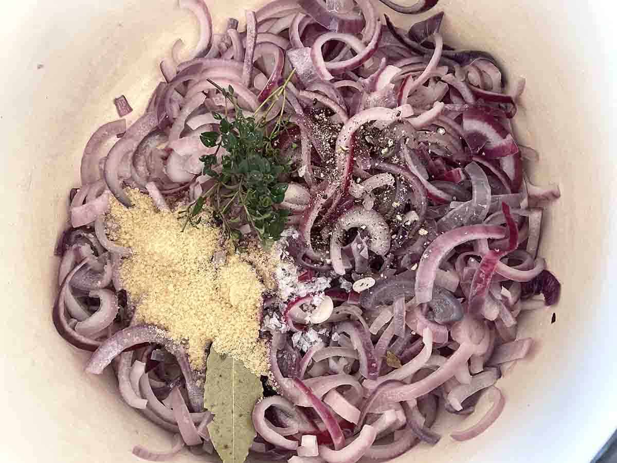 part cooked onions with sugar, herbs and seasoning added.