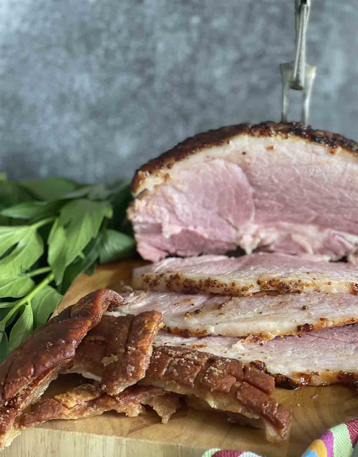 sliced gammon on a board.
