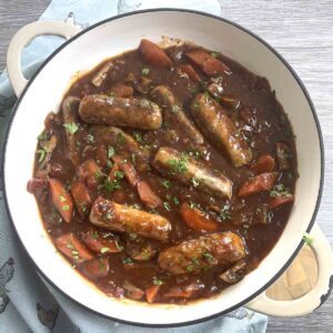 slow cooker sausage casserole in a serving dish.