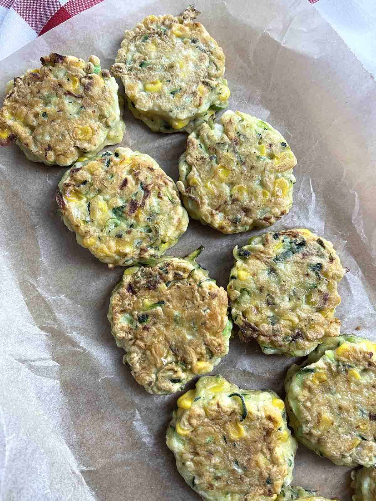 cooked fritters on a tray.