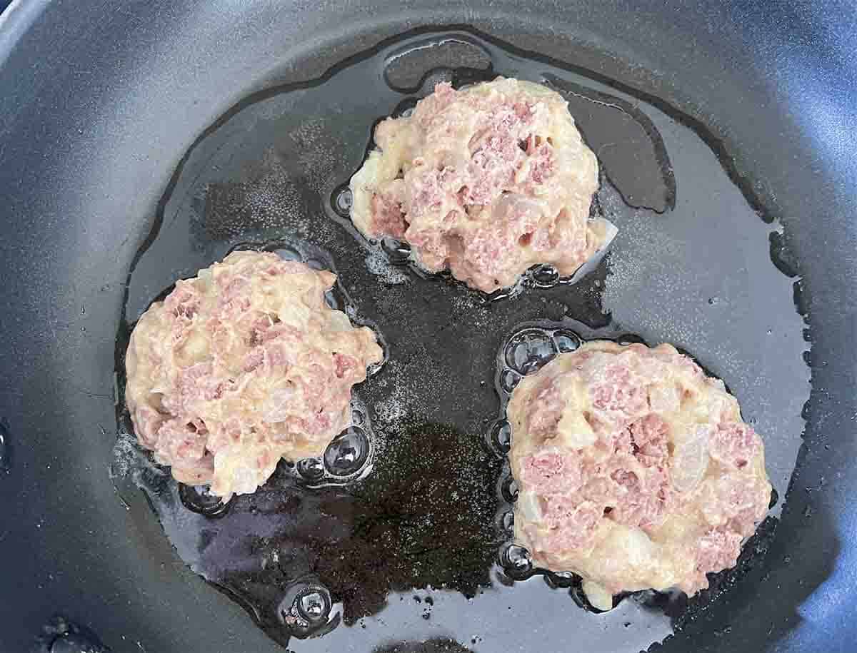 fritters in a pan.